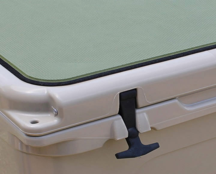 green foam cooler pad on top of cooler