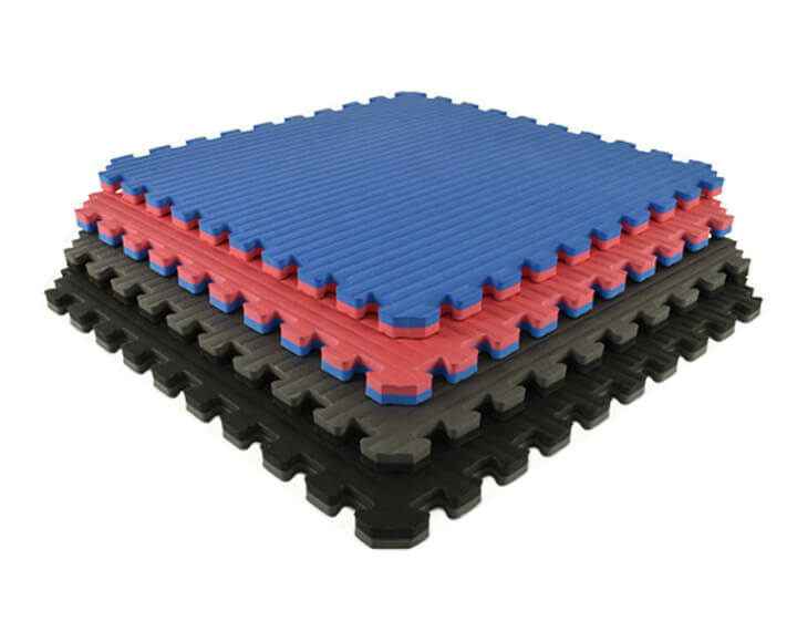 pile of interlocking sports foam mats