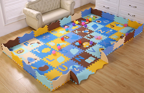 Kids play puzzle mats